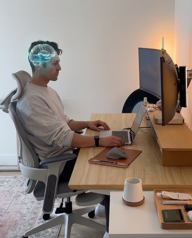 Un homme au travail, avec un cerveau en surimpression dont le niveau d'eau est bas